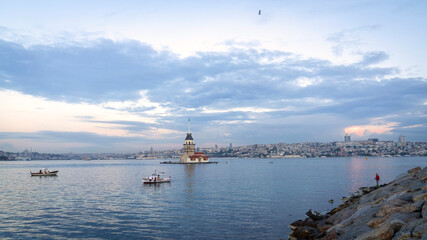 Fototapeta na wymiar Gorgeous Bosphorus photo with Maiden's Tower and clouds at sunrise.