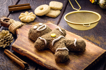 Christmas gingerbread cookies, homemade gingerbread man, being baked, cooking christmas dessert