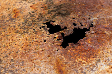 The surface of the steel plate is decayed from rust.lack of care