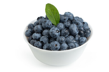 Blueberries in bowl isolated on white background