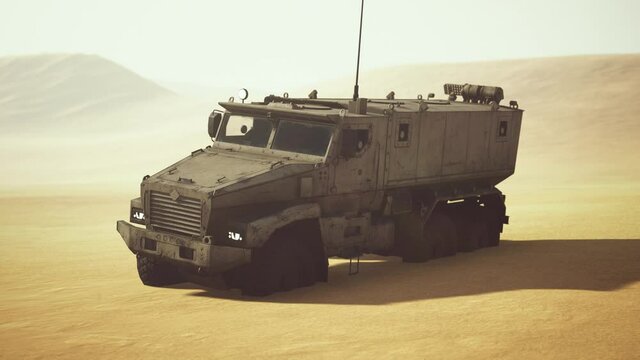 Armoured military truck in desert