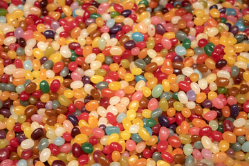 Multicolored jelly stick candies textured background