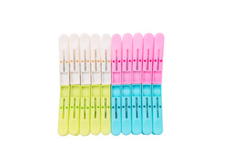 Pastel color clothespin on isolated white background