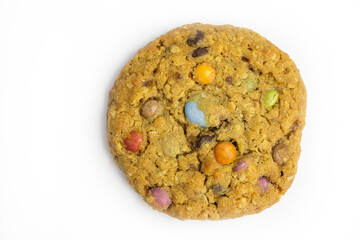 chocolate chip cookie with peanut butter, rolled oats and colorful chocolate candy
