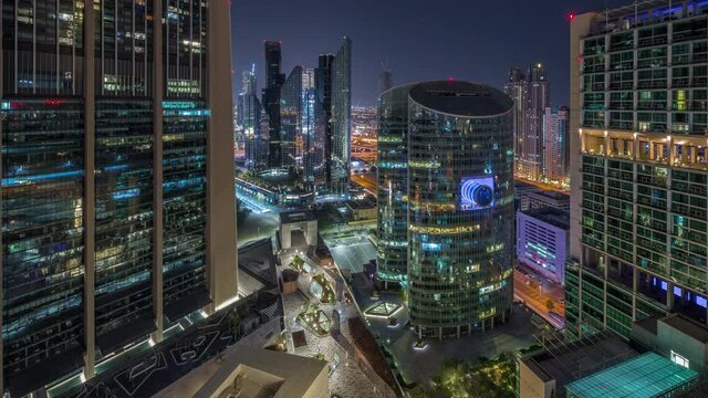 Dubai international financial center skyscrapers aerial all night timelapse.