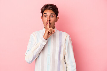 Young mixed race man isolated on white background keeping a secret or asking for silence.