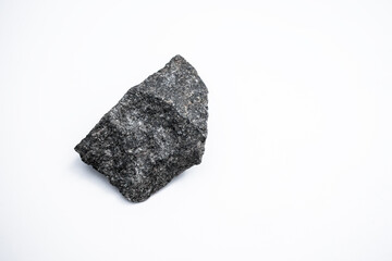 Black granite stone on a white isolate.