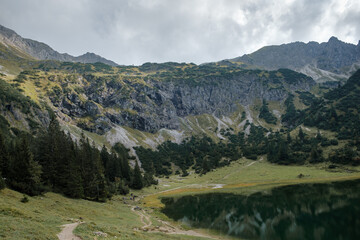 The mountain Entschenkopf and Nebelhorn in Germany with the lake Gaisalpsee in the foreground.