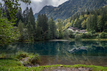 Naklejka na ściany i meble The mountain lake Christlessee in the near from Oberstdorf in Germany is famous for the clear water.