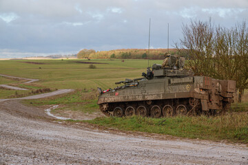 Fototapeta premium army infantry fighting vehicle in action on a military exercise