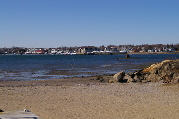 oceanscape with buildings across the bay