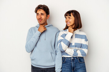 Young mixed race couple isolated on white background suffers pain in throat due a virus or infection.
