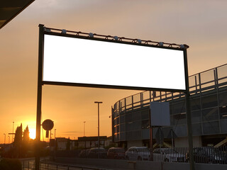 Road billboard in the sunset with white space mockup