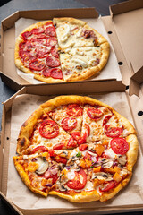 pizza mix different types of pizza in box fresh fast food ready to eat meal snack on the table copy space food background rustic 