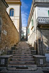 Fototapeta na wymiar A narrow street in Ascoli Satriano, an old town in the province of Foggia, Italy.