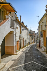 Naklejka na ściany i meble A narrow street in Ascoli Satriano, an old town in the province of Foggia, Italy.