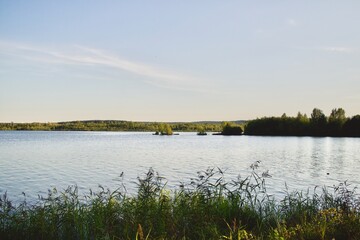 Natural landscape overlooking the water and forest in Yekaterinburg
