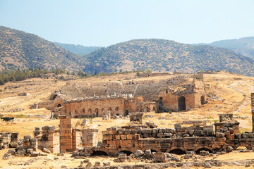 Fototapeta na wymiar View of the ruins of an ancient amphitheater near Pamukkale, Turkey