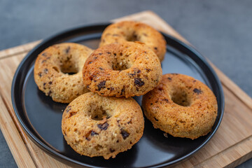 sweet home made chocolate chip donuts on a table