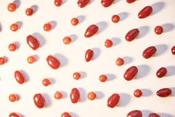 Organic autumn berries of viburnum and dogwood pattern. Healthy food for tea, compote and jam concept. Hard shadows. Top view background