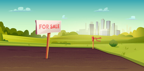 Sale of suburban land. A sign on the ground for the sale. Rural area near the city. Field or site for construction
