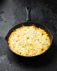 Korean Corn Cheese in cast iron skillet frying pan