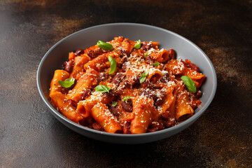 Traditional Italian Pasta e fagioli with bean, tomato and parmesan cheese
