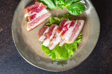 bacon lard salted raw fat homemade pork meal snack on the table copy space food background rustic 