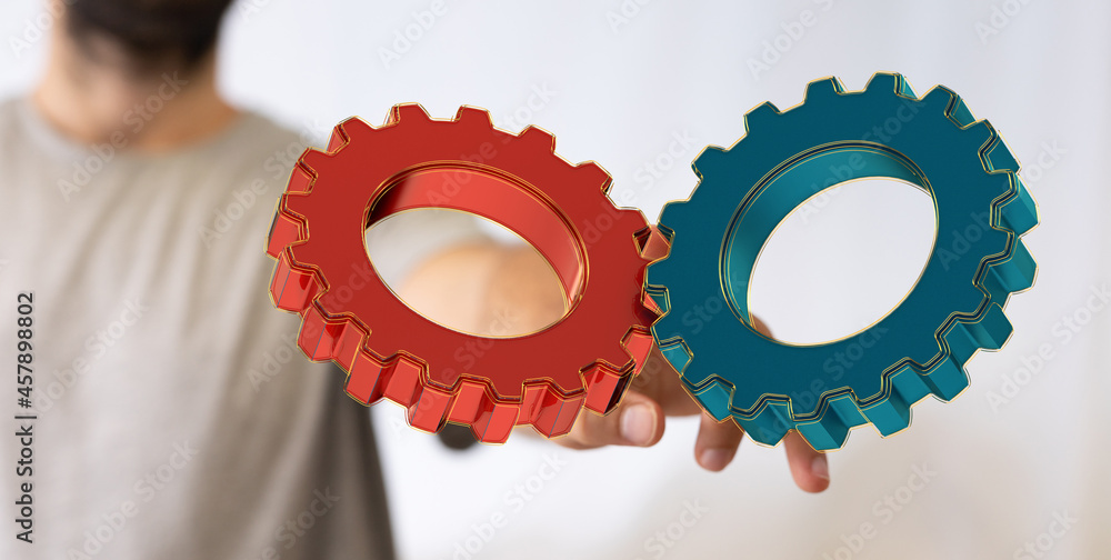 Aufkleber Man draws gears on virtual screen. Blurred Abstract engine room..