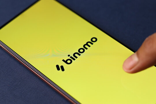 Assam, india - July 28, 2020 : Binomo a easy online stock trading app.
