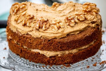 A Coffee and Walnut Cake on a Cake Stand for Afternoon Tea