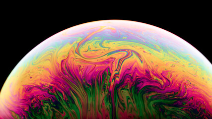 Soap Bubble Ball on black background. Abstract semicircle colorful background. Model of Space or planets universe cosmic. Real macro photo.