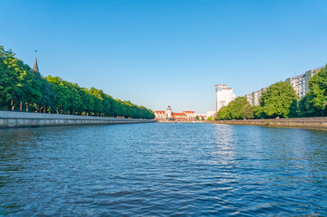 Fototapeta premium Fishing Village - ethnographic and trading-craft center in Kaliningrad. Quarter, built houses in the German style. Pregolya River, Russia, Europe.