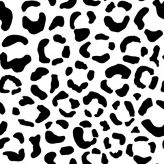 Fototapeta na wymiar Seamless animal pattern with leopard dots. Creative monochrome texture for fabric, wrapping. Vector illustration
