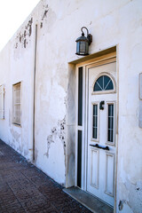 Fototapeta na wymiar Typical Andalusian whitewashed facade in Almeria, Spain
