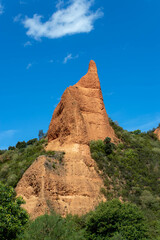 Fototapeta na wymiar Bright rock peak at the Las Medulas historic gold mining site on a sunny day.