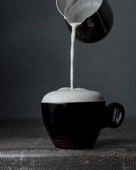 
a cup of coffee with thick foam - 457906248