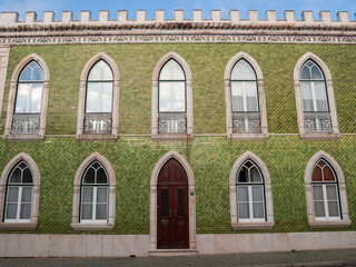 Green tiled building facade