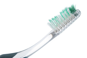Used toothbrush close up isolated on white background