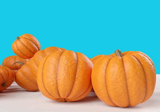 Orange pumpkins. Pumpkins on a blue background. Harvest of vegetables. Agricultural products. Pumpkin dishes. Vegetarian diet. Halloween symbols. Jack lantern. All Saint eve. Autumn holiday. 3d image