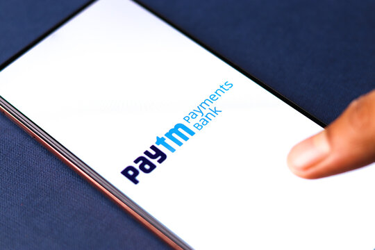 West Bangal, India - August 21, 2021 : Paytm payments bank logo on phone screen stock image.
