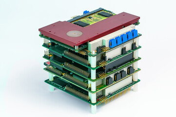 pc104 stack of rugged embedded computer boards on white background
