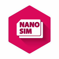 White Nano Sim Card icon isolated with long shadow. Mobile and wireless communication technologies. Network chip electronic connection. Pink hexagon button. Vector