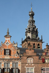 Facades of medieval houses and with the tower of the Stevenskerk in Nijmegen, Netherlands.