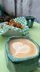 Lovely Coffee and potato chips in green