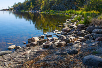 Fototapeta na wymiar Cape Impiniemi and Lake Impilampi on the shores of Lake Ladoga in Karelia in the Gulf of Impilahti top view