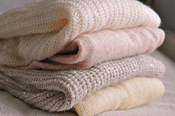 Close up of cozy warm sweaters copy space 
