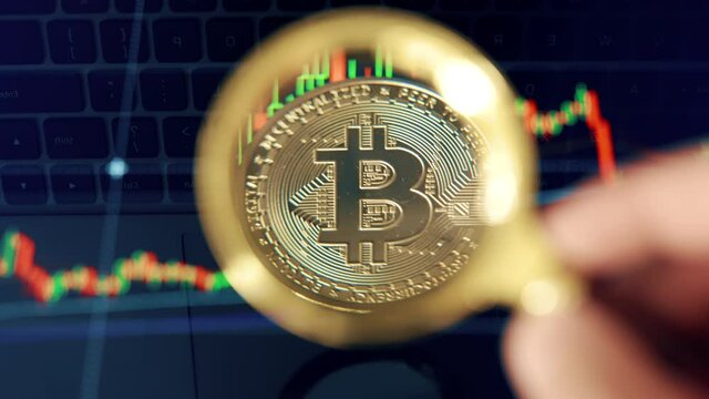 Bitcoin stock growth. Candles chart of btc with magnifier. Investing in virtual assets. Investment platform with charts and bit coin.