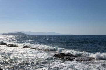 Fototapeta premium Landscape of the sea with the surf with a cloudless sky