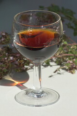 A cup of spanish sweet wine u derecho the sun light.